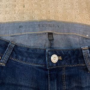 Skinny jeans. Never worn. Sequin cut outs.